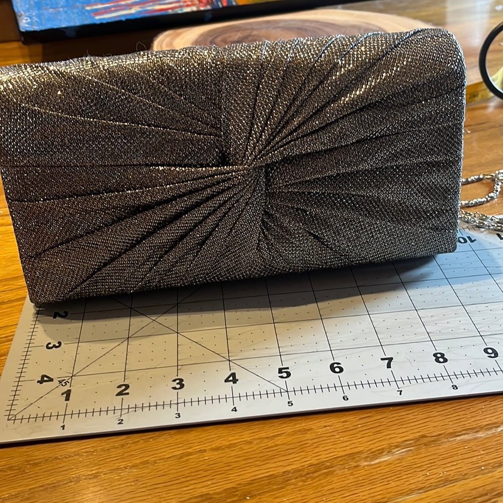 Silver evening clutch bag with optional shoulder chain